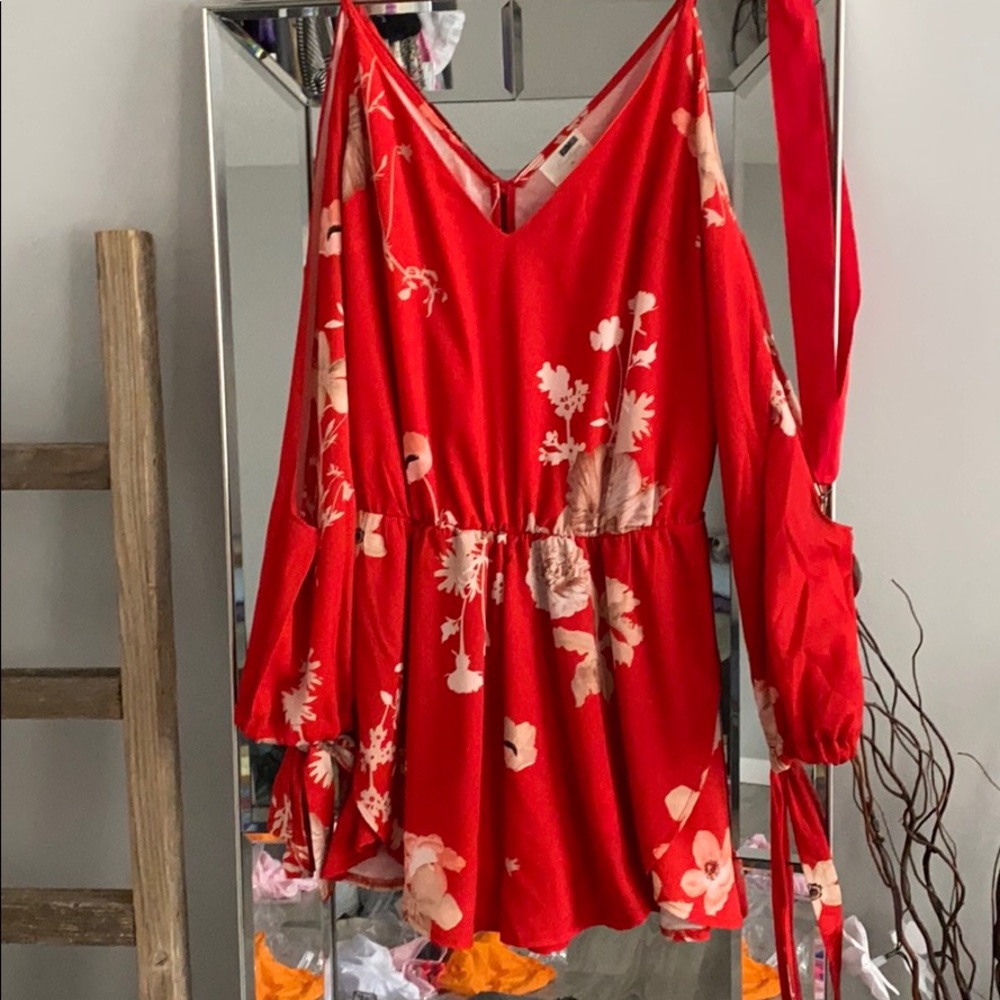 Floral Romper with cut out sleeves